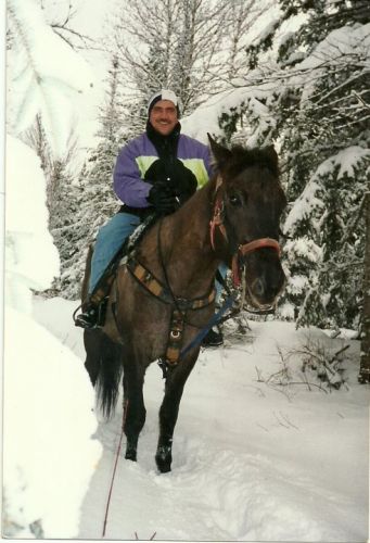 mon père  avec Charcoal un Q-H en rando a Notre-Dame-des-bois.