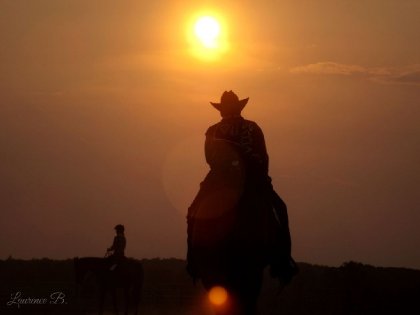 Cowboy au coucher du soleil