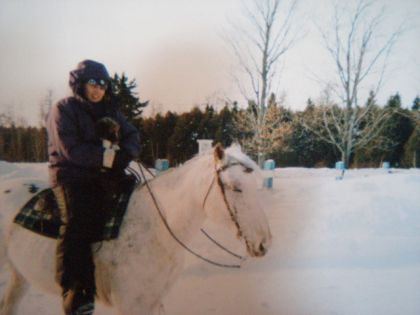 À cheval avec un chien
