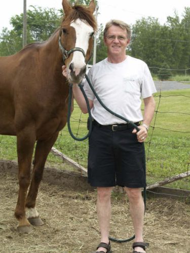 mon père avec le cheval de ma mère!