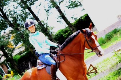 Happy girl on a pretty horse (L)