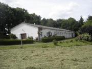 Bâtiment équestre avec habitation