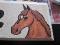 Cheval sur une plaque de boxe