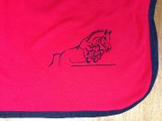 Broderie sur couvre reins