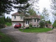 Fermette avec manège intérieur - Rive-nord de Montréal