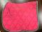 tapis de selle et polos roses