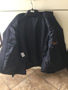 Veston de compétition fillette, taille 14 ans.